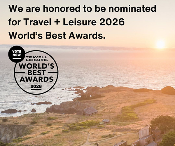 A view of the property at sunset